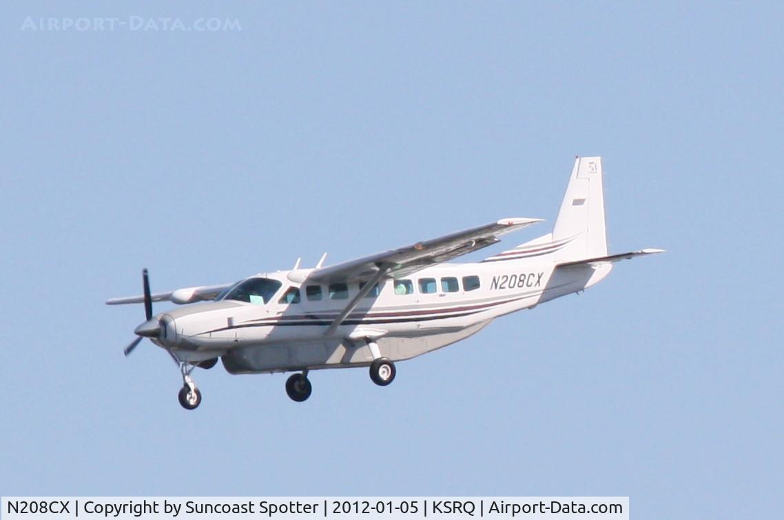 N208CX, 2003 Cessna 208B C/N 208B1014, Sky Limo flight 2354 on approach to Runway 32 at Sarasota-Bradenton International Airport following a flight from Naples Municipal Airport