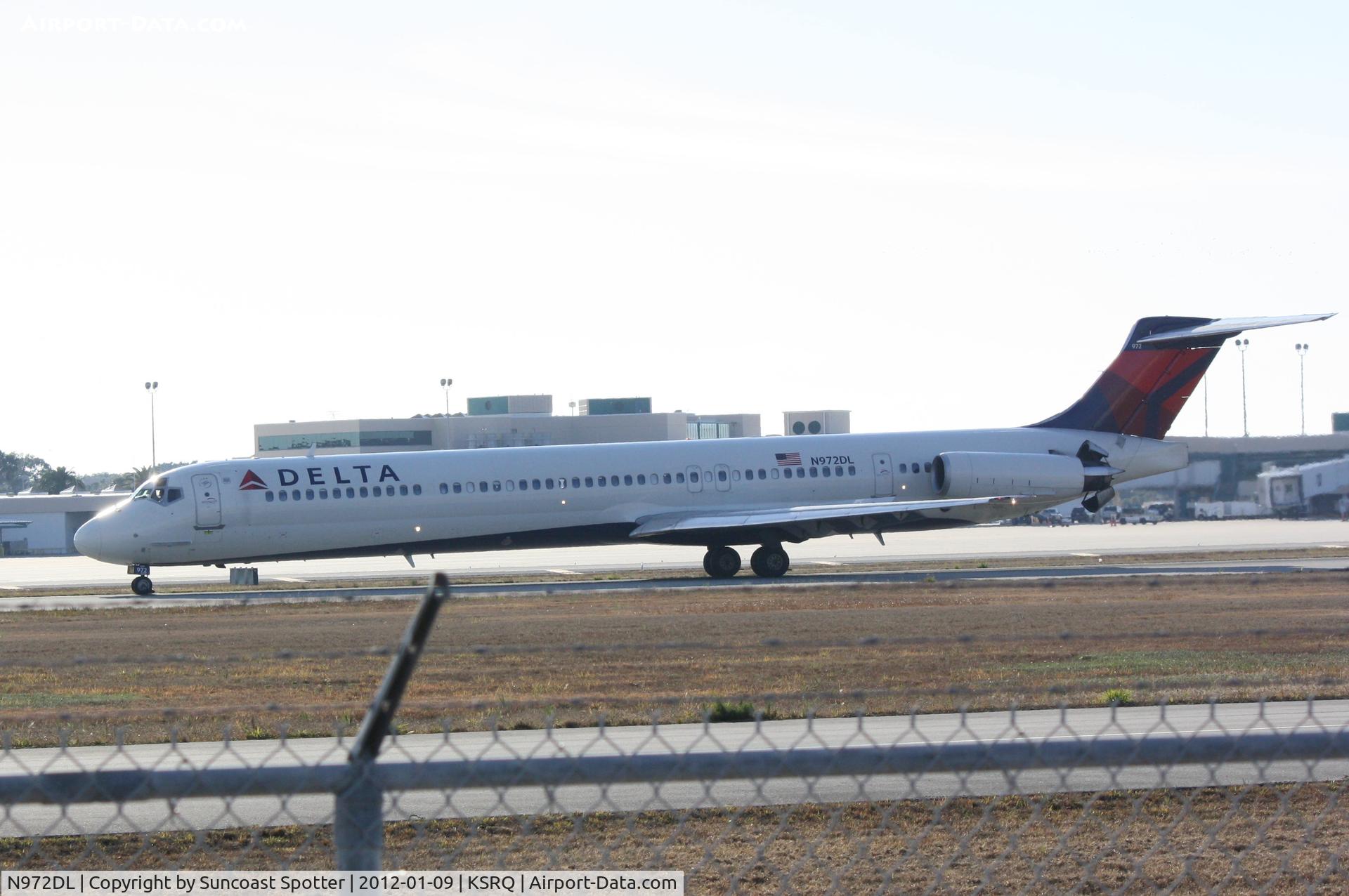 N972DL, 1991 McDonnell Douglas MD-88 C/N 53215, Delta Flight 1297 arrives on Runway 14 at Sarasota-Bradenton International Airport following a flight from Hartsfield-Jackson Atlanta International Airport