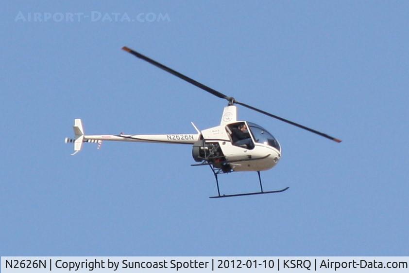 N2626N, 2004 Robinson R22 BETA C/N 3644, N2626N flying over Sarasota-Bradenton International Airport