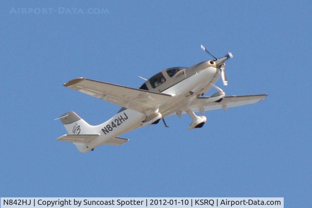 N842HJ, 2007 Cirrus SR22 C/N 2519, N842HJ departs Runway 14 at Sarasota-Bradenton International Airport enroute to Boca Raton Airport