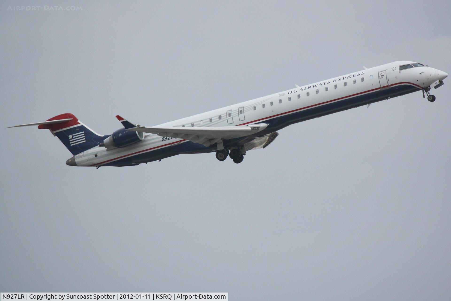 N927LR, 2005 Bombardier CRJ-900ER (CL-600-2D24) C/N 15027, Mesa Airlines/US Airways Express Flight 2646 departs Runway 14 at Sarasota-Bradenton International Airport enroute to Charlotte/Douglas International Airport