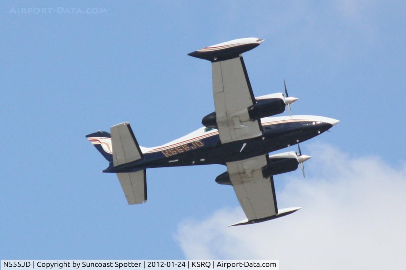 N555JD, 1979 Cessna 310R C/N 310R1629, N555JD departs Runway 14 at Sarasota-Bradenton International Airport enroute to  Evansville Regional Airport