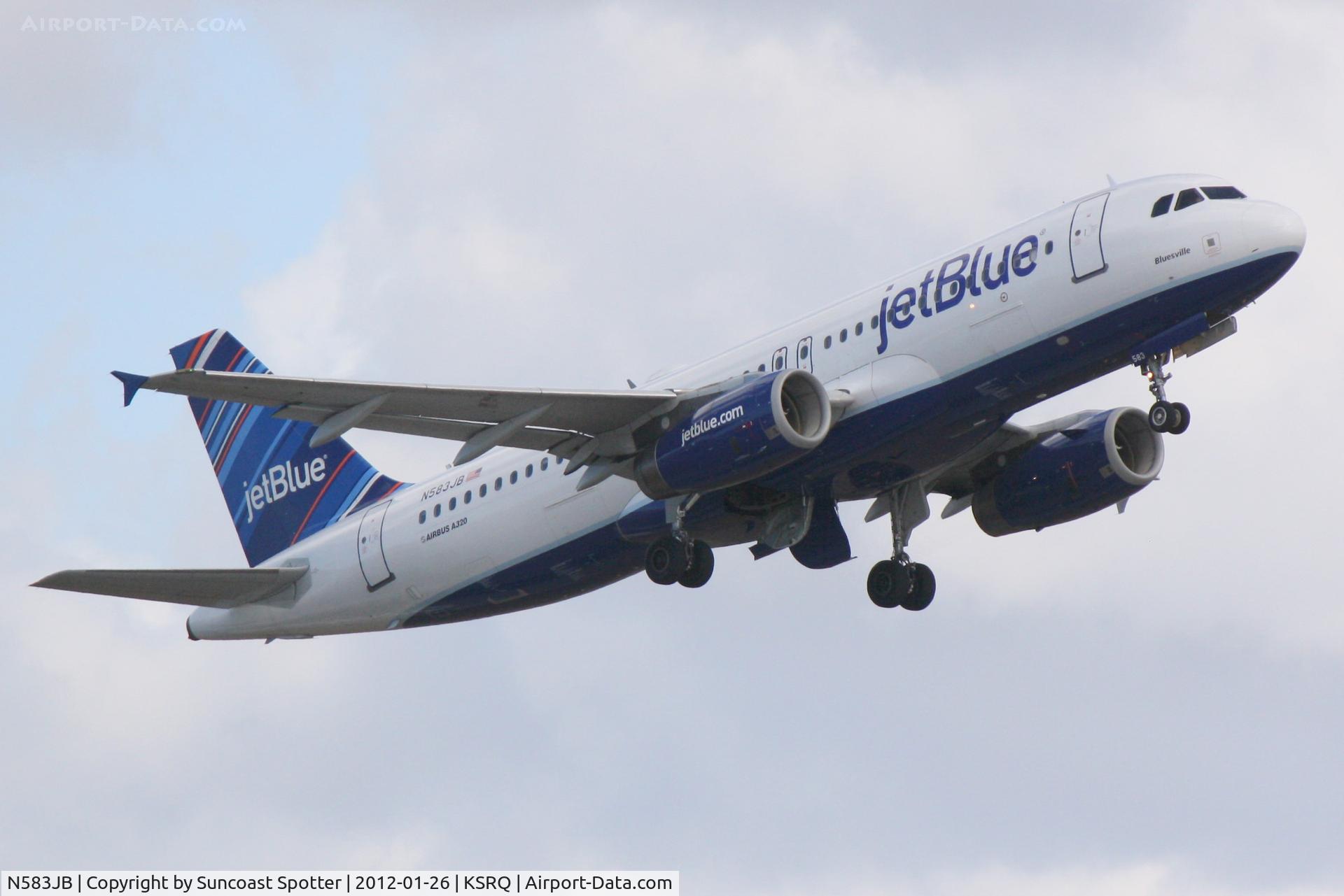 N583JB, 2004 Airbus A320-232 C/N 2150, Jet Blue 346 departs Runway 14 at Sarasota-Bradenton International Airport enroute to John F Kennedy International Airport
