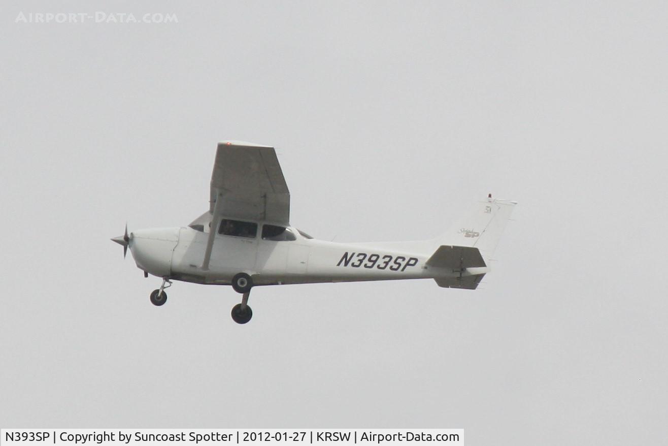N393SP, 1999 Cessna 172S C/N 172S8290, N393SP flies over Sarasota-Bradenton International Airport