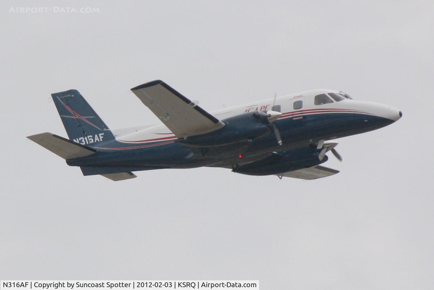 N316AF, 1980 Embraer EMB-110P1 Bandeirante C/N 110.271, N316AF departs Runway 14 at Sarasota-Bradenton International Airport