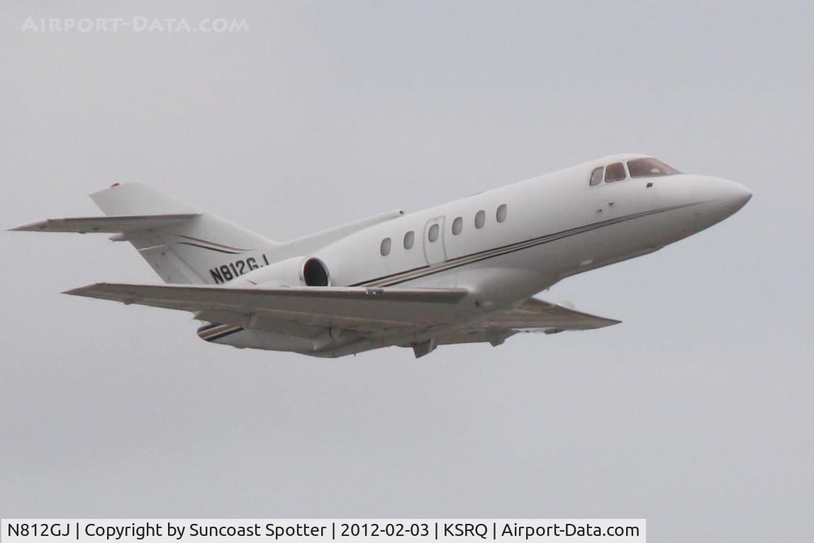 N812GJ, 1988 British Aerospace BAe.125 Series 800A C/N 258112, N812GJ departs Runway 14 at Sarasota-Bradenton International Airport enroute to Van Nuys Airport