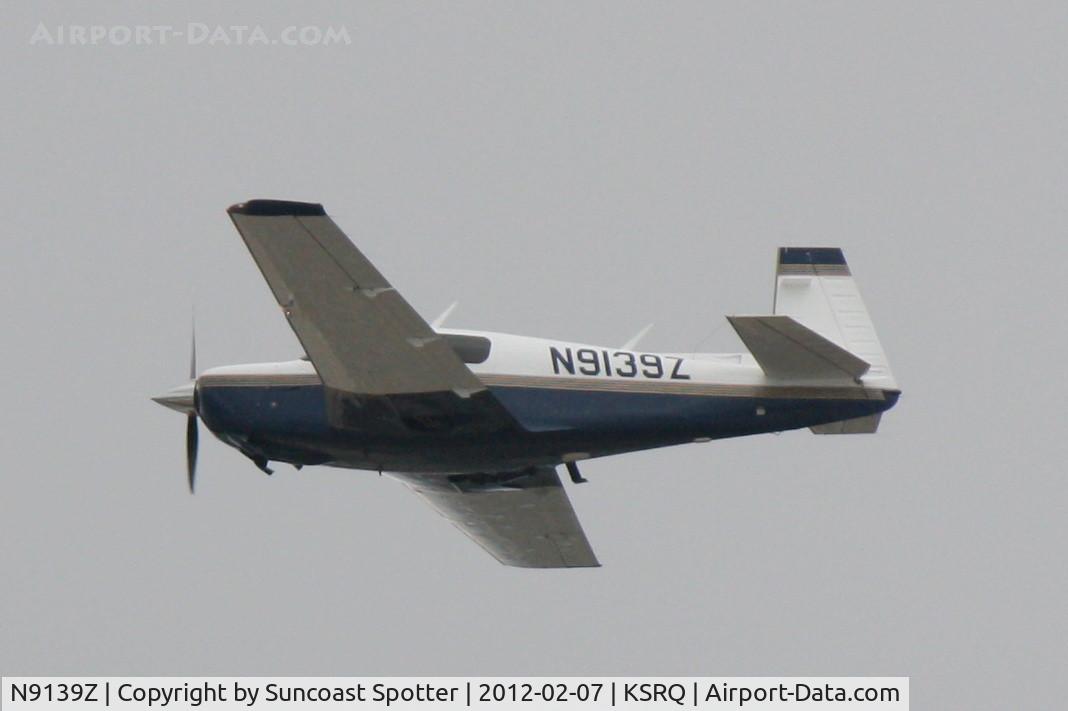 N9139Z, 1992 Mooney M20J 201 C/N 24-3285, N9139Z departs Runway 32 at Sarasota-Bradenton International Airport