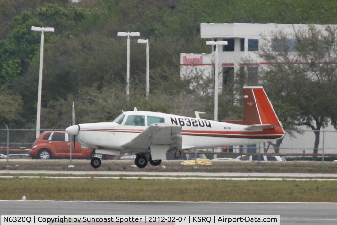 N6320Q, 1967 Mooney M20C Ranger C/N 670139, N6320Q arrives on Runway 32 at Sarasota-Bradenton International Airport