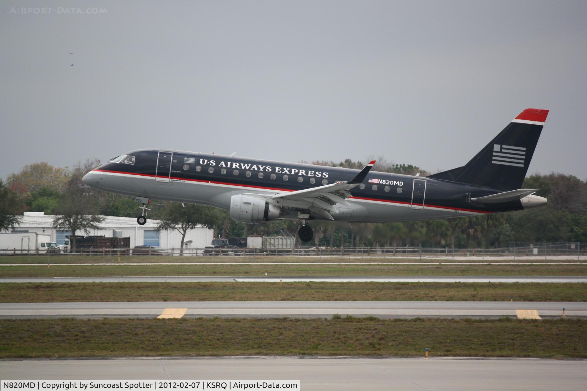 N820MD, 2004 Embraer 170SU (ERJ-170-100SU) C/N 17000041, Republic/US Airways Flight 3399 on approach to Runway 32 at Sarasota-Bradenton International Airport following a flight from Reagan National Airport