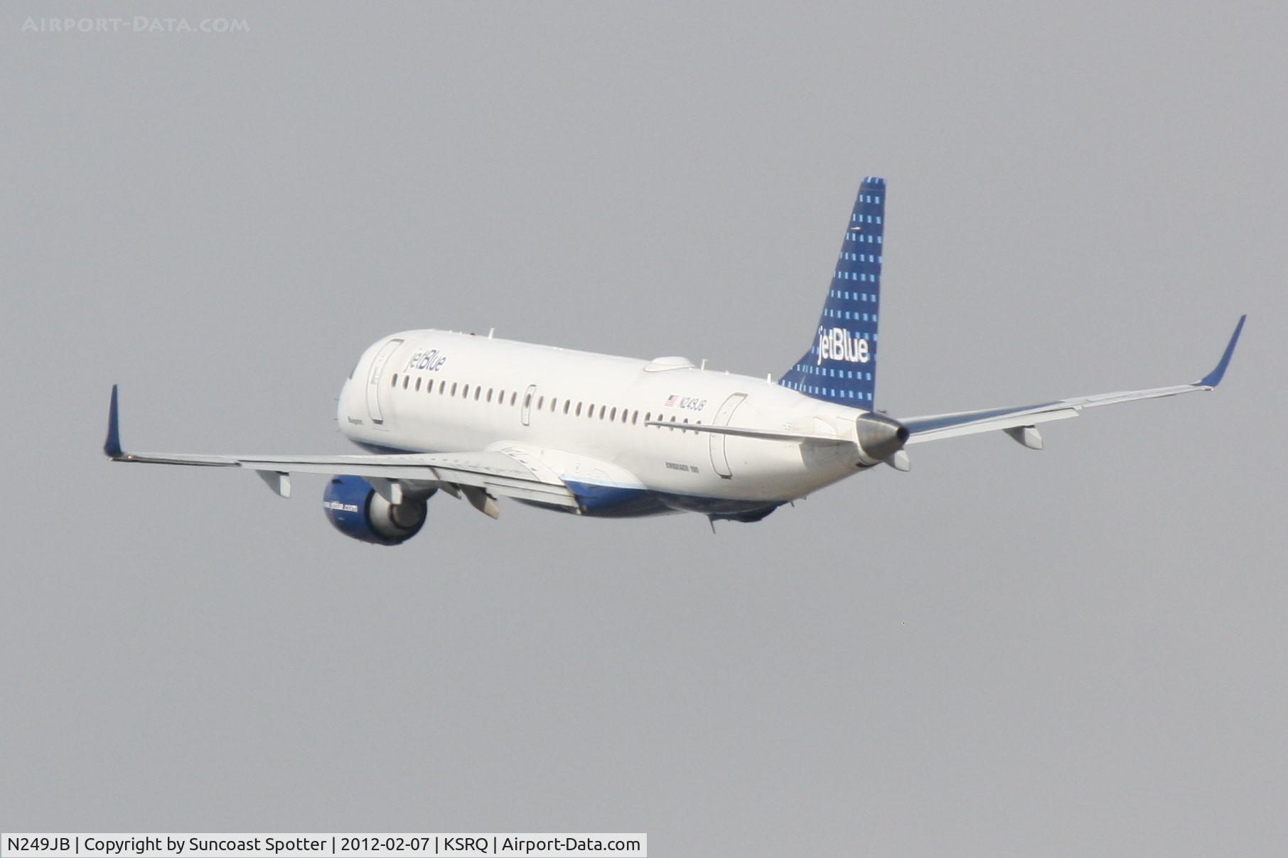 N249JB, 2006 Embraer 190AR (ERJ-190-100IGW) C/N 19000045, JetBlue Flight 1188 departs Runway 32 at Sarasota-Bradenton International Airport enroute to Boston Logan International Airport