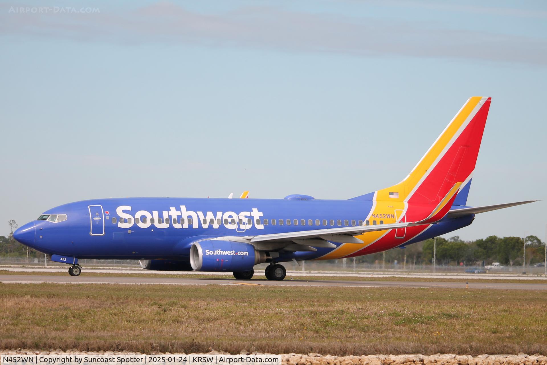 N452WN, 2004 Boeing 737-7H4 C/N 29846, Southwest Flight 986 taxis at Southwest Florida International Airport prior to flight to Baltimore-Washington International Airport