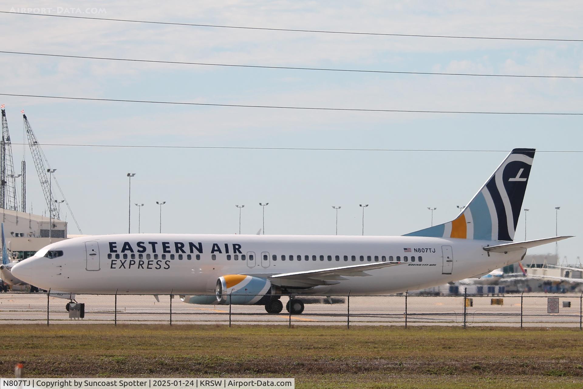 N807TJ, 1992 Boeing 737-4Q8 C/N 25098, Eastern Air Express Flight 2160 taxis at Southwest Florida International Airport following flight from Santa Clara Airport