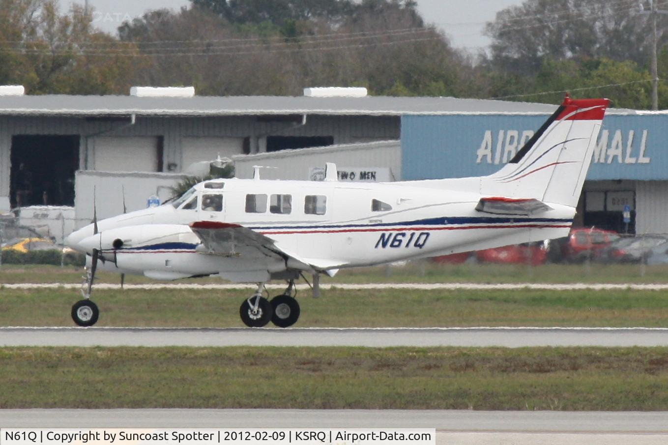 N61Q, 1968 Beech 65-A90-1 C/N LM-92, N61Q arrives on Runway 32 at Sarasota-Bradenton International Airport