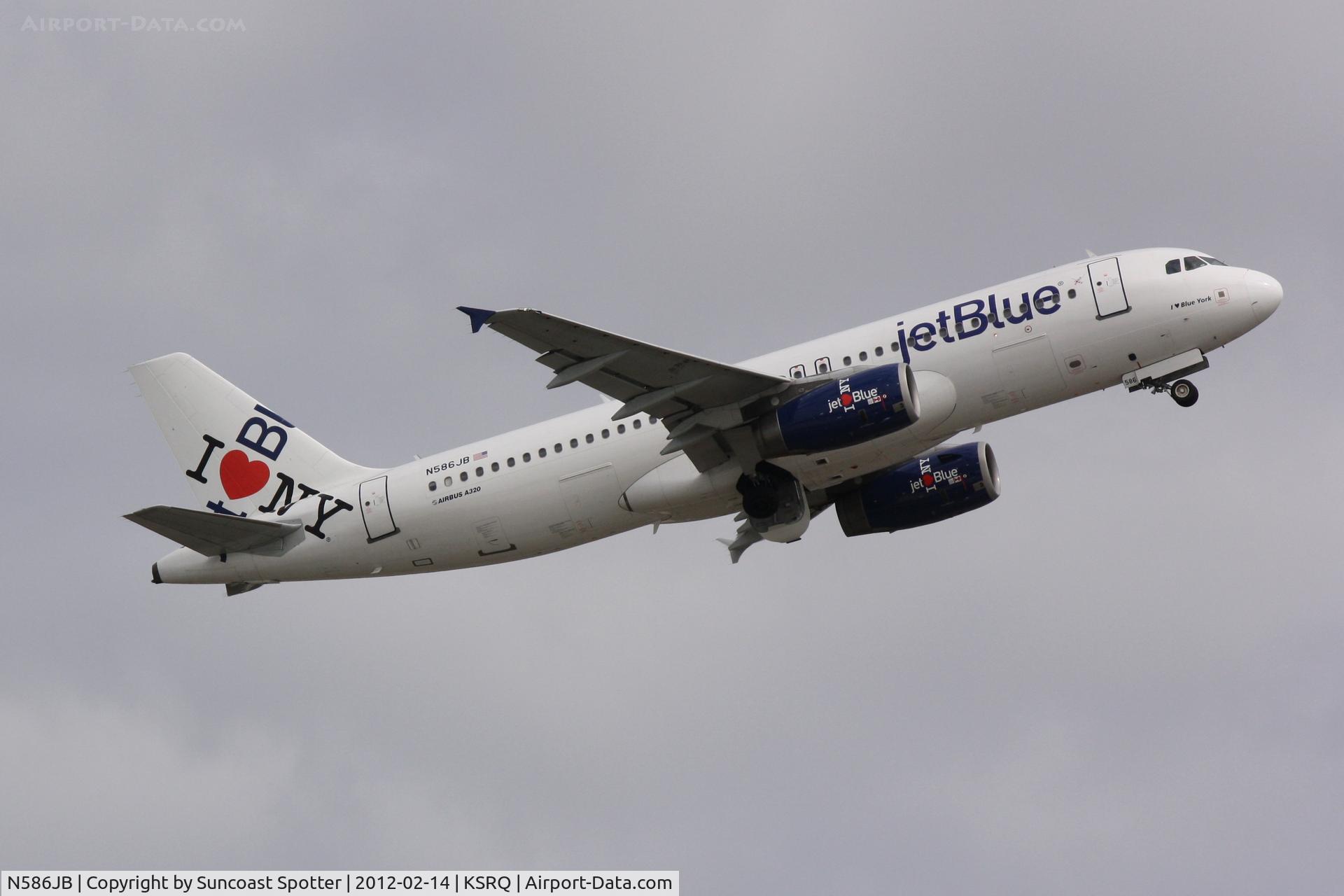 N586JB, 2004 Airbus A320-232 C/N 2160, JetBlue Flight 346 departs Runway 14 at Sarasota-Bradenton International Airport enroute to John F Kennedy International Airport