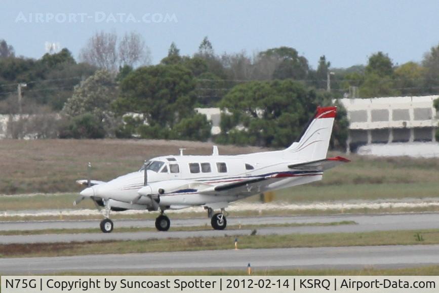 N75G, 1967 Beech U-21A Ute C/N LM-83, N75G arrives on Runway 22 at Sarasota-Bradenton International Airport