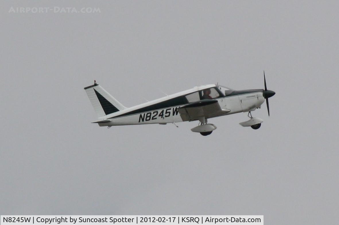N8245W, 1965 Piper PA-28-180 C/N 28-2391, N8245W departs Runway 14 at Sarasota-Bradenton International Airport