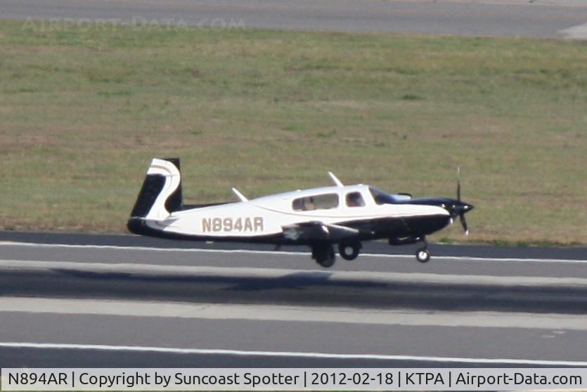 N894AR, 1989 Mooney M20M Bravo C/N 27-0034, N894AR arrives on Runway 19L at Tampa International Airport following a flight from Bartow Municipal Airport