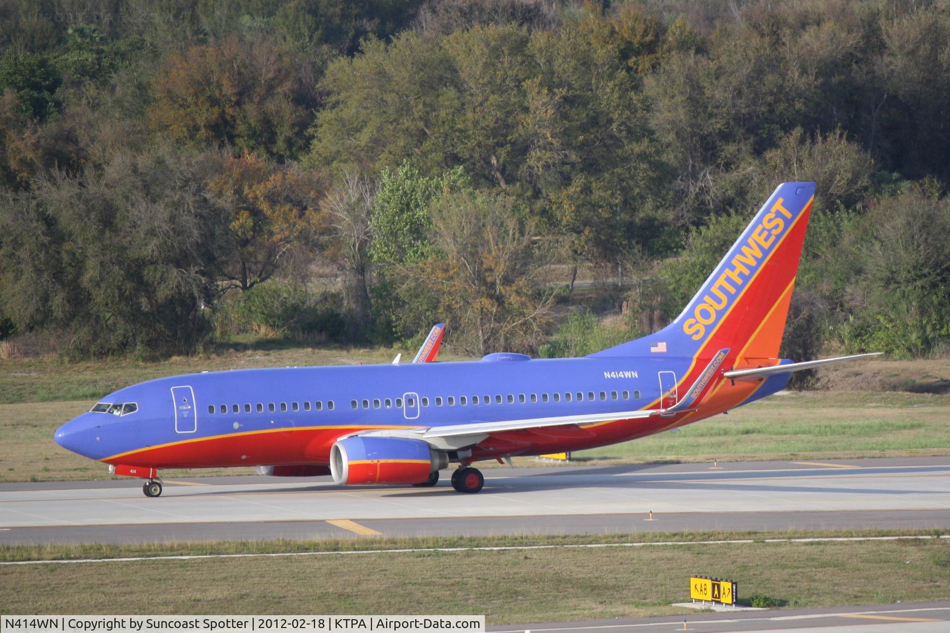 N414WN, 2001 Boeing 737-7H4 C/N 29820, Southwest Flight 767 taxis for departure from Tampa International Airport prior to a flight to William Hobby International Airport