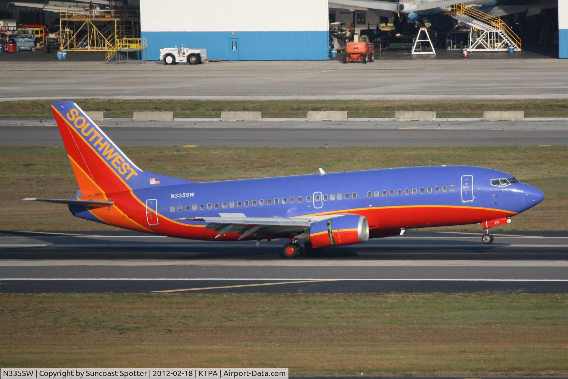 N335SW, 1988 Boeing 737-3H4 C/N 23939, Southwest Flight 1928 arrives on Runway 19L at Tampa International Airport following a flight from Austin-Bergstrom International Airport