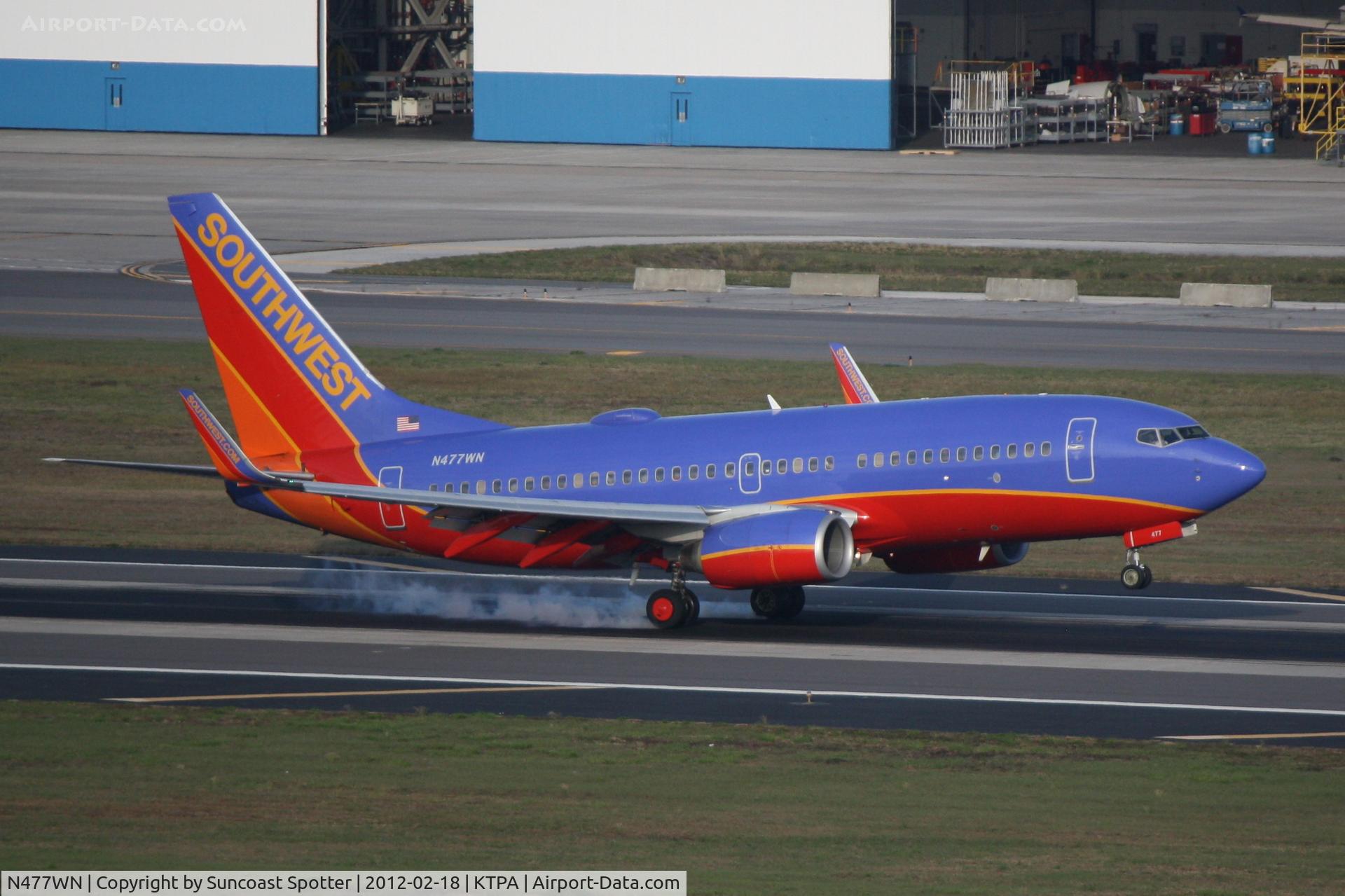 N477WN, 2004 Boeing 737-7H4 C/N 33988, Southwest Flight 1054 arrives on Runway 19L at Tampa International Airport following a flight from Albany International Airport