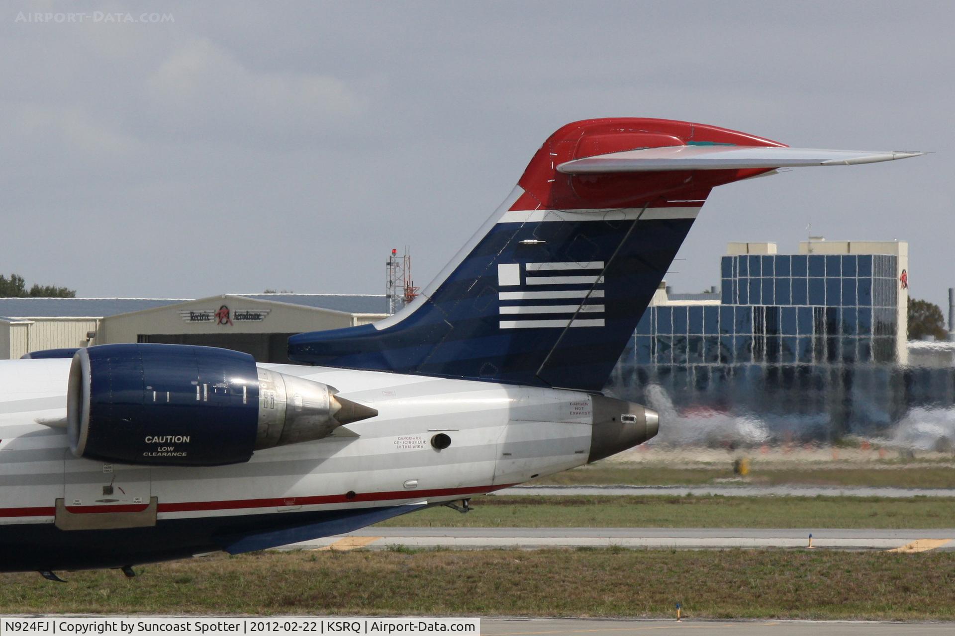 N924FJ, 2004 Bombardier CRJ-900ER (CL-600-2D24) C/N 15024, Mesa/US Flight 2607 arrives on Runway 14 at Sarasota-Bradenton International Airport following a flight from Charlotte/Douglas International Airport