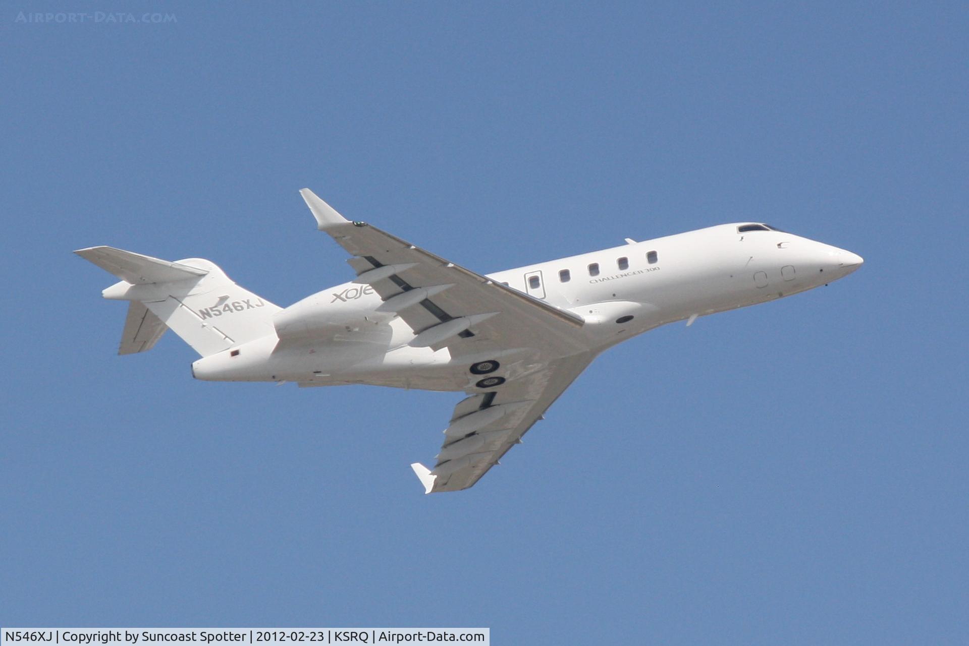 N546XJ, 2009 Bombardier Challenger 300 (BD-100-1A10) C/N 20280, N546XJ departs Runway 14 at Sarasota-Bradenton International Airport enroute to Phoenix/Goodyear Airport