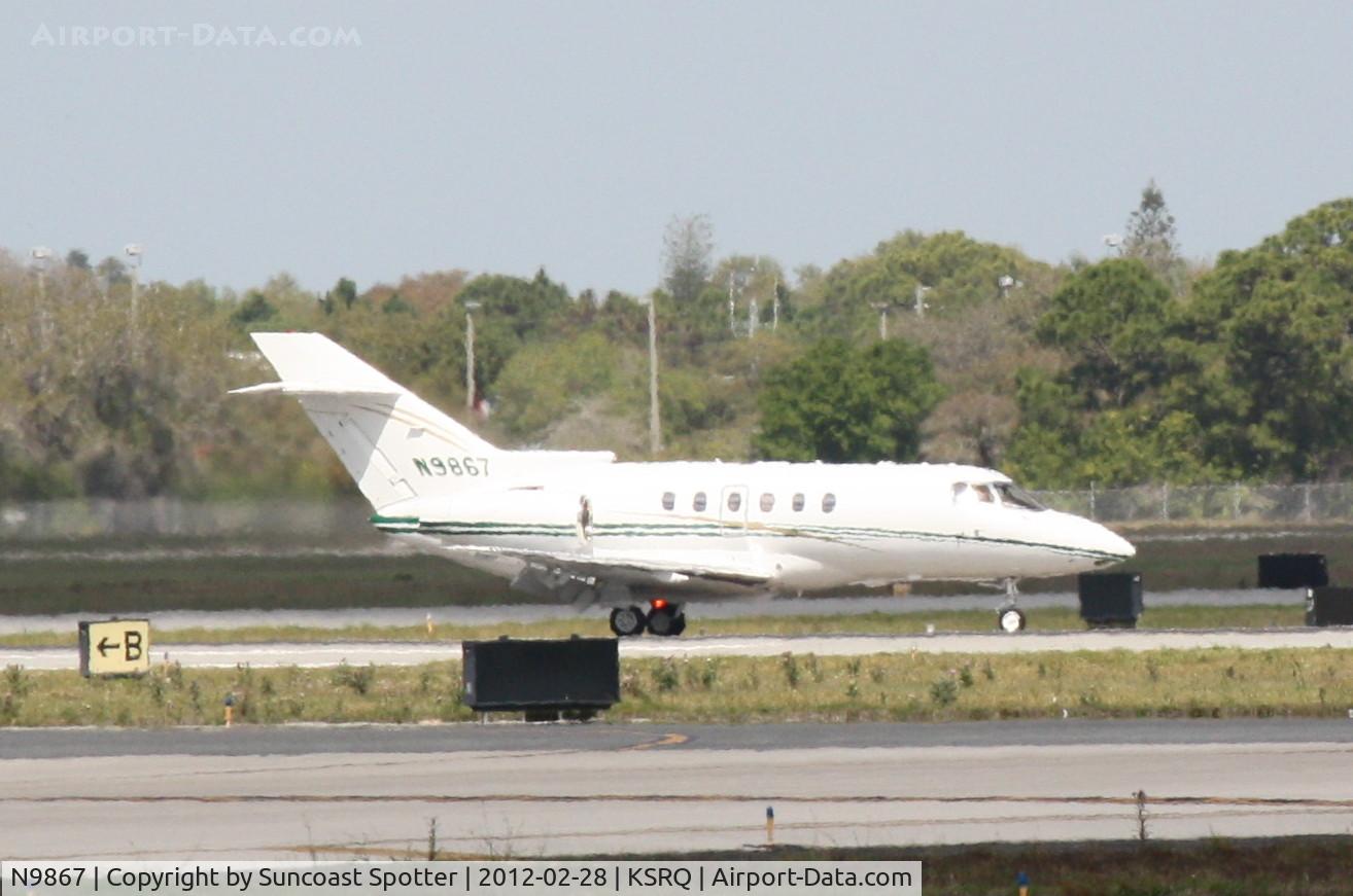 N9867, 2004 Raytheon Hawker 800XP C/N 258678, N9867 arrives on Runway 14 at Sarasota-Bradenton International Airport
