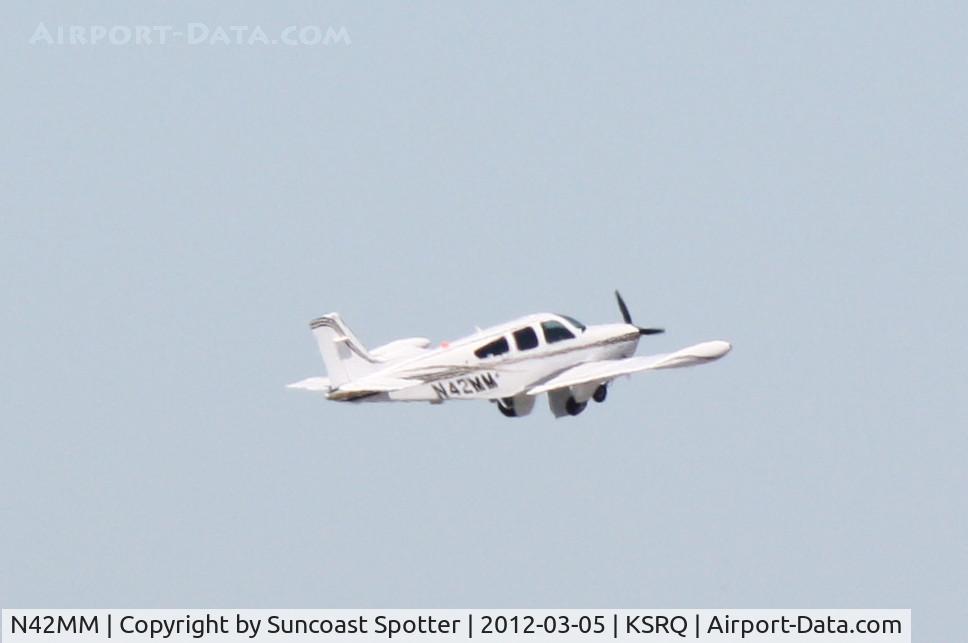 N42MM, 1988 Beech F33A Bonanza C/N CE-1278, N42MM departs Runway 4 at Sarasota-Bradenton International Airport