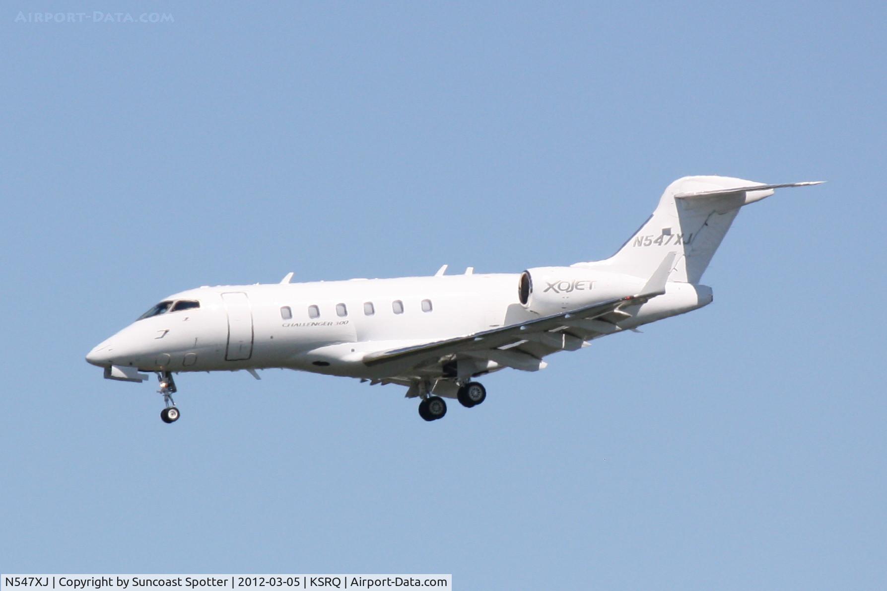 N547XJ, 2009 Bombardier Challenger 300 (BD-100-1A10) C/N 20281, N547XJ on approach to Runway 32 at Sarasota-Bradenton International Airport following a flight from Laurence G Hanscom Field