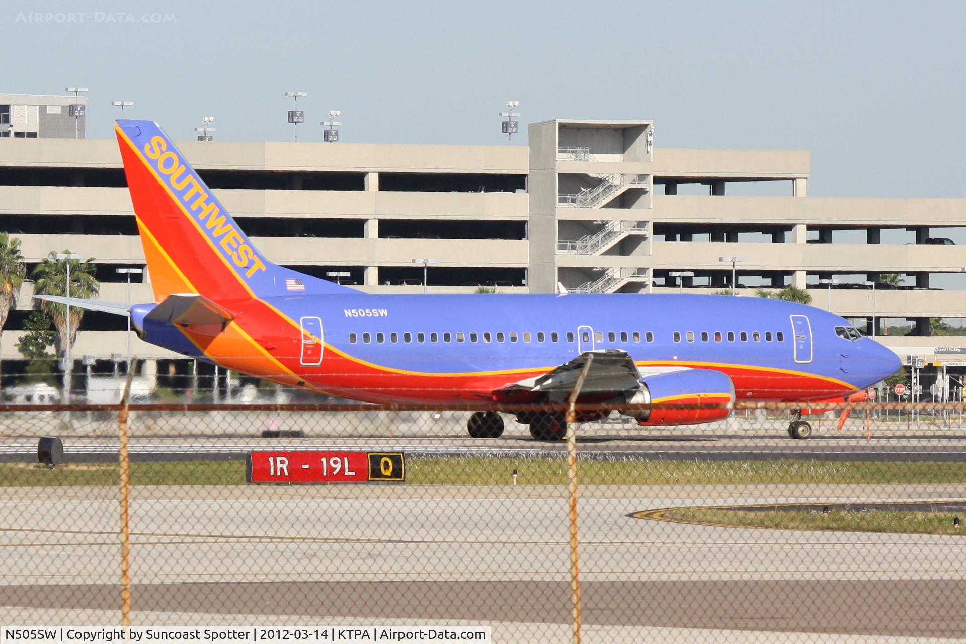 N505SW, 1990 Boeing 737-5H4 C/N 24182, Southwest Flight 2967 departs Runway 1R at Tampa International Airport enroute to Philadelphia International Airport