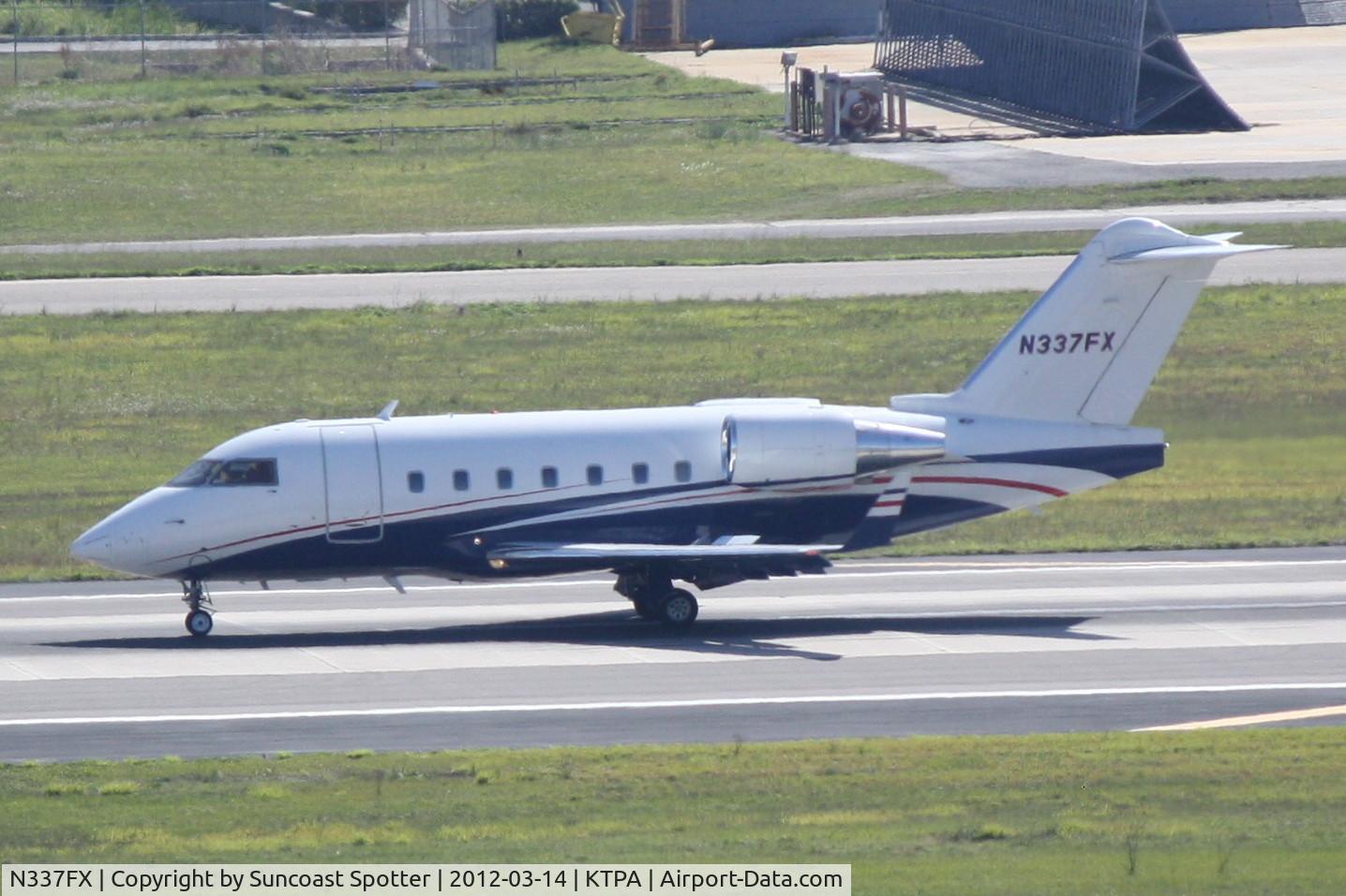 N337FX, 2006 Bombardier Challenger 604 (CL-600-2B16) C/N 5647, Solutions Flight 337 arrives on Runway 1R at Tampa International Airport following a flight from Washington-Dulles International Airport