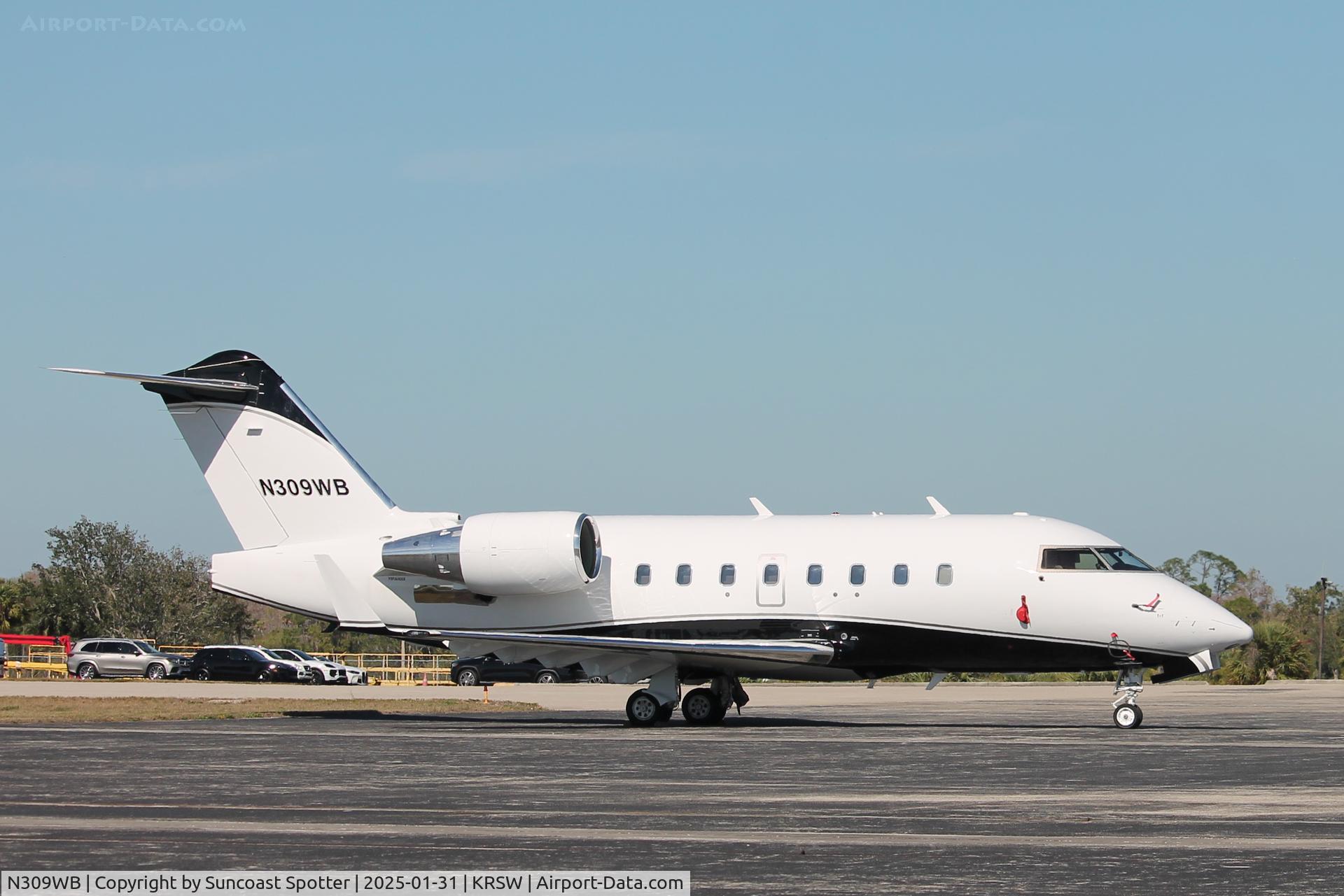 N309WB, 1998 Bombardier Challenger 604 (CL-600-2B16) C/N 5394, Challenger 309WB sits on the Private Sky ramp at Southwest Florida International Airport