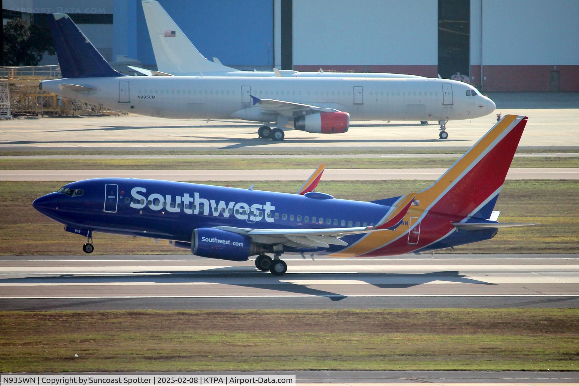 N935WN, 2009 Boeing 737-7H4 C/N 36641, Southwest Flight 1789 departs Runway 1R at Tampa International Airport enroute to Baltimore-Washington International Airport