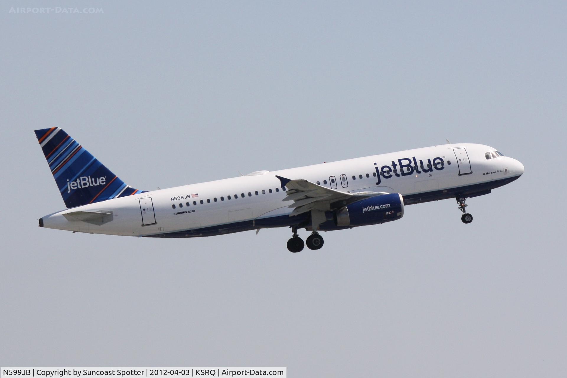 N599JB, 2004 Airbus A320-232 C/N 2336, JetBlue Flight 346  departs Runway 14 at Sarasota-Bradenton International Airport enroute to Charlotte Douglas International Airport