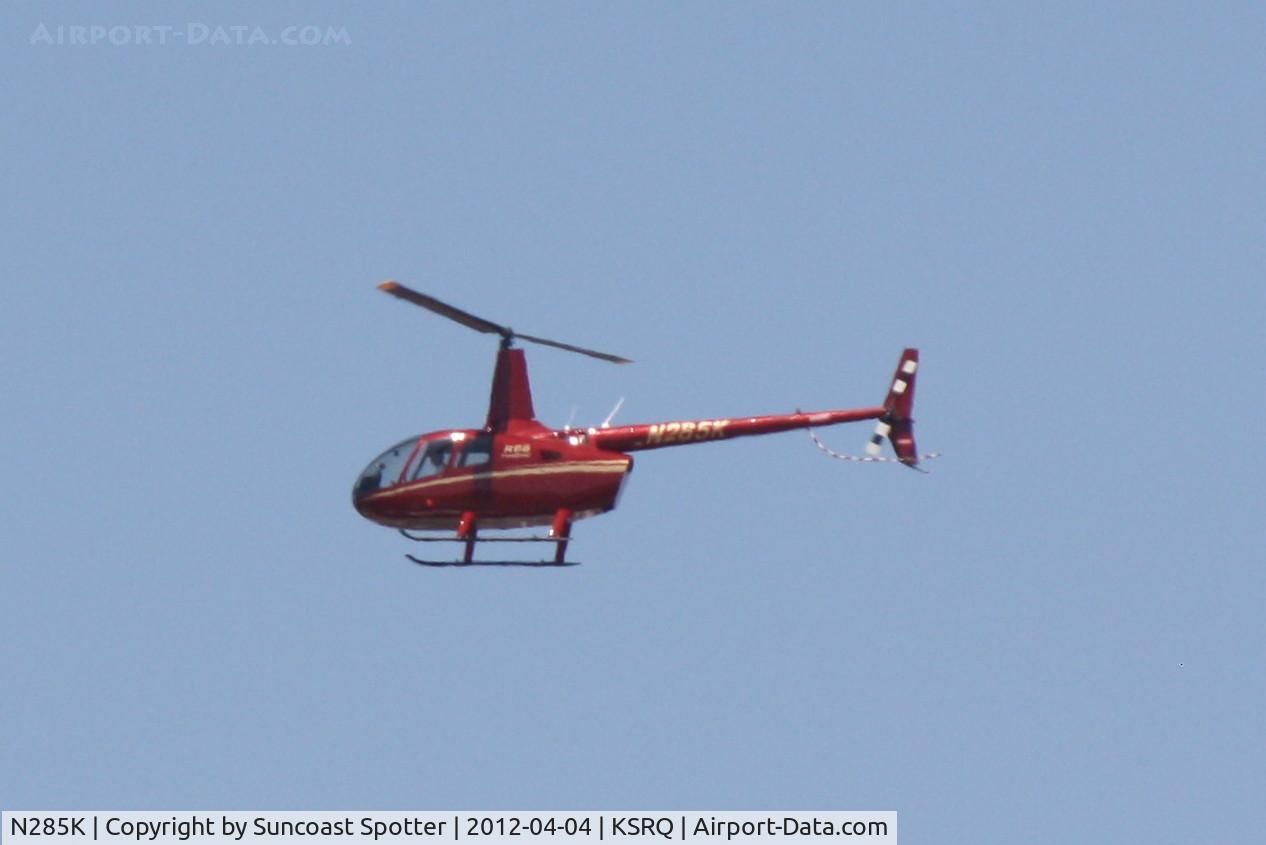 N285K, Robinson R66 C/N 0073, N285K departs Sarasota-Bradenton International Airport