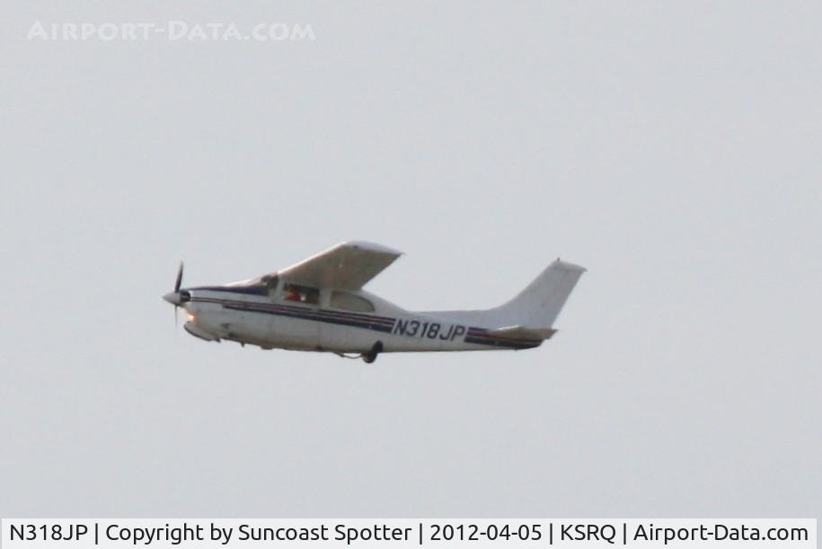 N318JP, 1975 Cessna 210L Centurion C/N 21060770, N318JP departs Runway 22 at Sarasota-Bradenton International Airport