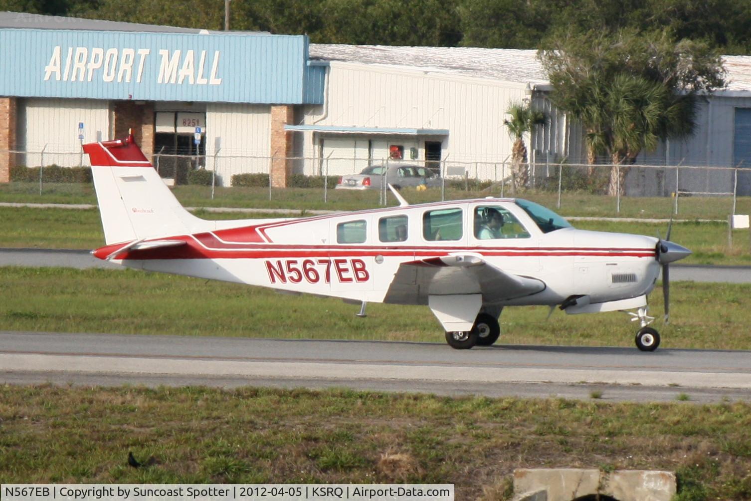 N567EB, 1979 Beech A36 Bonanza 36 C/N E-1543, N567EB taxis for departure at Sarasota-Bradenton International Airport