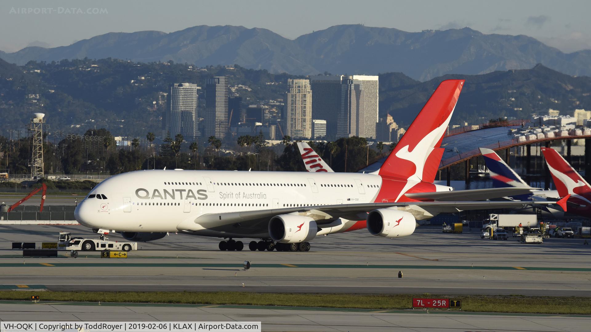 VH-OQK, 2011 Airbus A380-842 C/N 063, Getting towed to parking at LAX