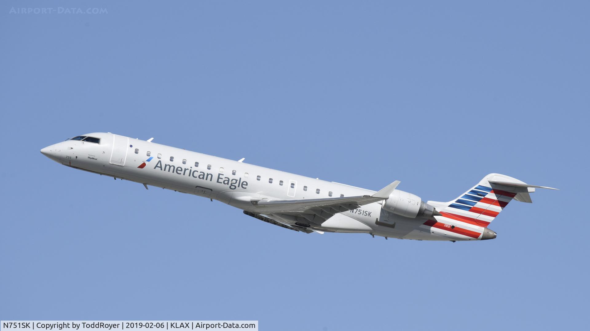 N751SK, 2005 Bombardier CRJ-701ER (CL-600-2C10) Regional Jet C/N 10208, Departing LAX on 25R