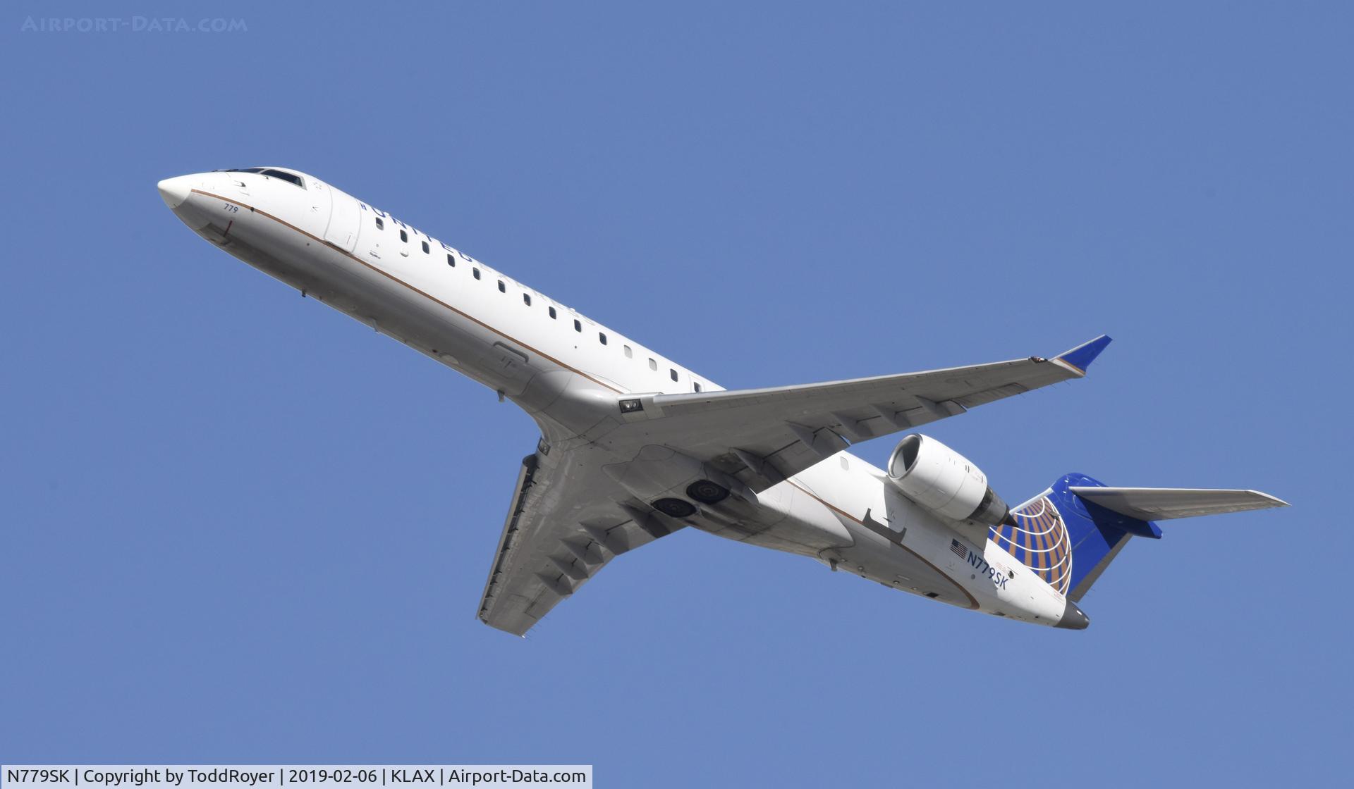 N779SK, 2009 Bombardier CRJ-702 (CL-600-2C10) Regional Jet C/N 10276, Departing LAX on 25R