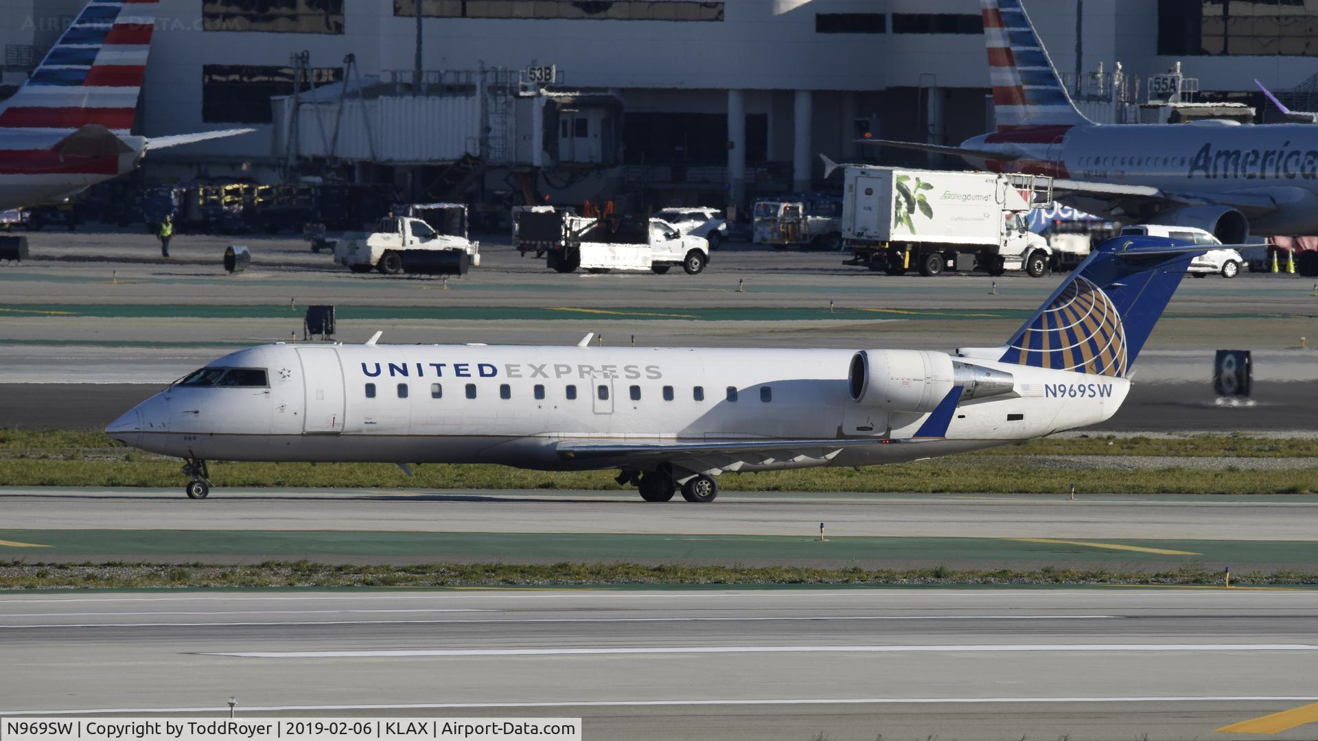 N969SW, 2003 Bombardier CRJ-200ER (CL-600-2B19) C/N 7876, Arriving at LAX on 25L