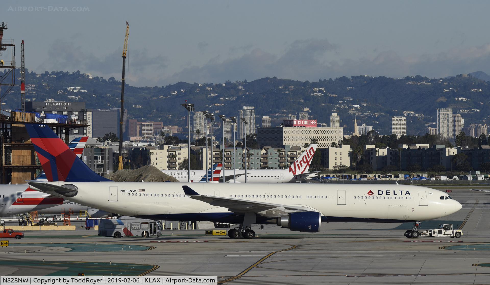 N828NW, 2016 Airbus A330-302 C/N 1720, Getting towed to gate at LAX