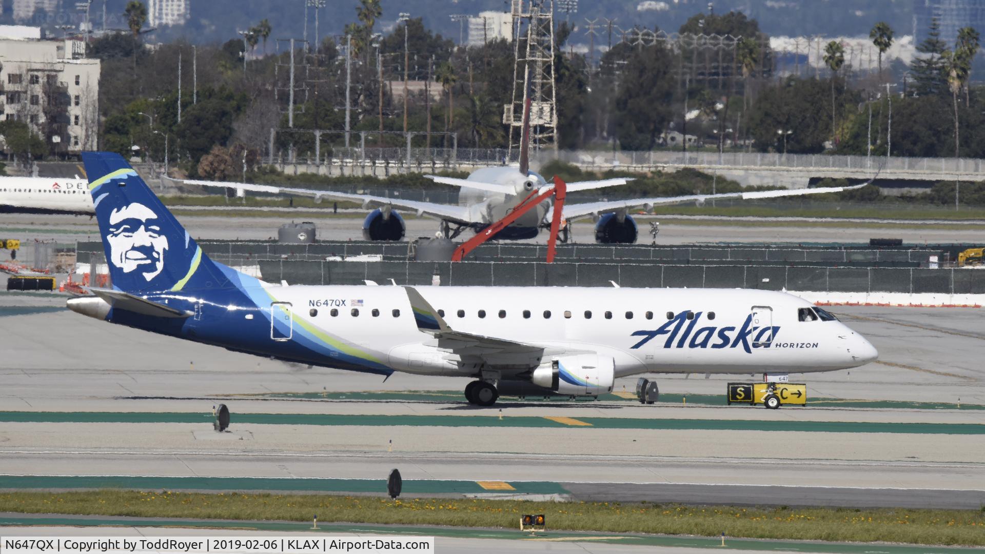 N647QX, 2018 Embraer 175LR (ERJ-170-200LR) C/N 17000773, Taxiing to gate at LAX