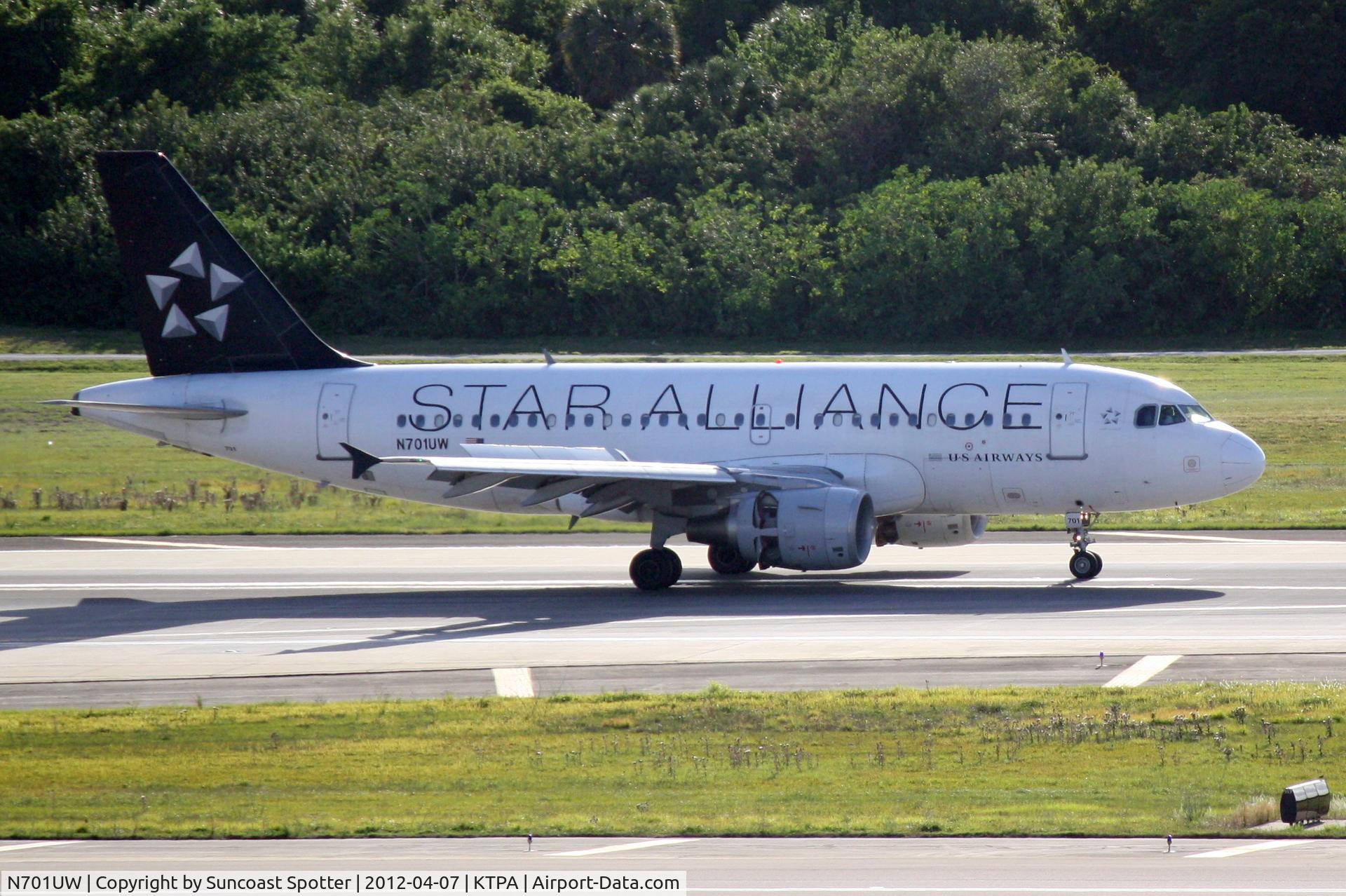 N701UW, 1998 Airbus A319-112 C/N 0890, US Air Flight 739 arrives on Runway 1L at Tampa International Airport following a flight from Philadelphia International Airport