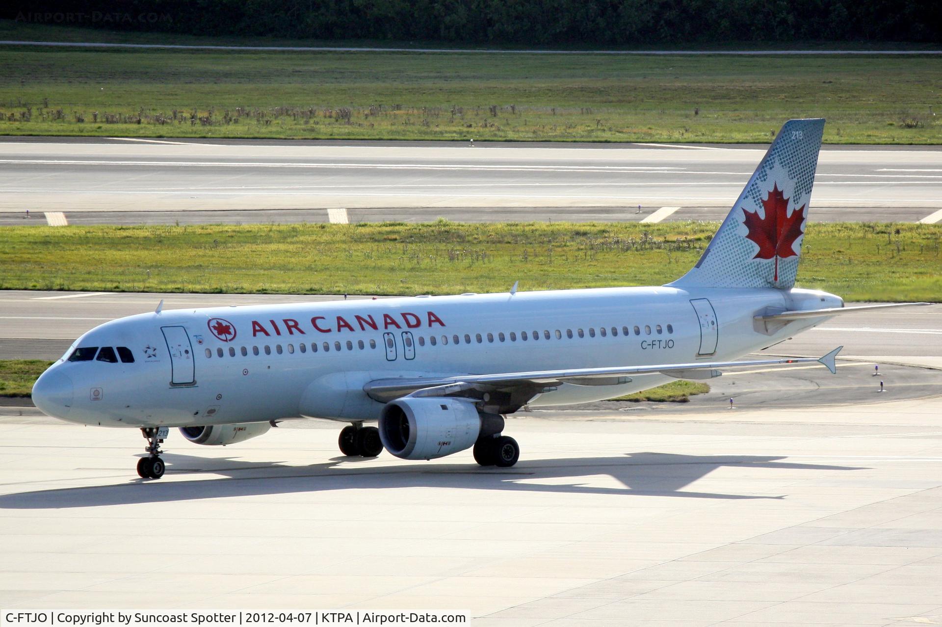 C-FTJO, 1991 Airbus A320-211 C/N 183, Air Canada Flight 1214 arrives on Runway 1L at Tampa International Airport following a flight from Montreal-Trudeau International Airport
