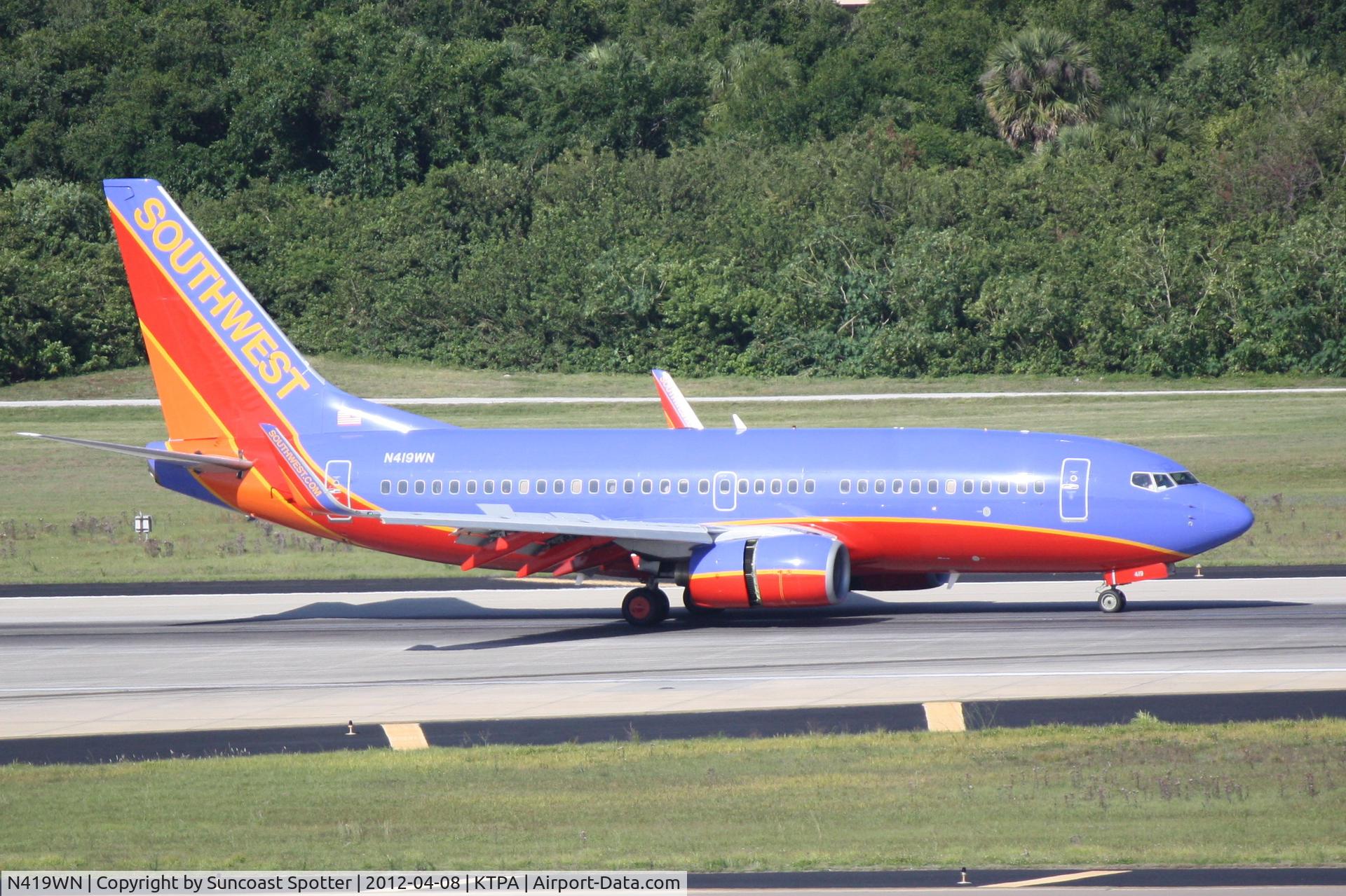 N419WN, 2001 Boeing 737-7H4 C/N 29824, Southwest Flight 3952 arrives on Runway 1L at Tampa International Airport following a flight from Manchester International Airport