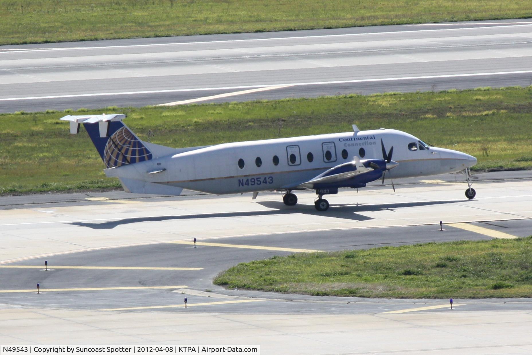 N49543, 1995 Beech 1900D C/N UE-181, Silver Airways/United Express Flight 4038 arrives on Runway 1R at Tampa International Airport following a flight from Key West International Airport
