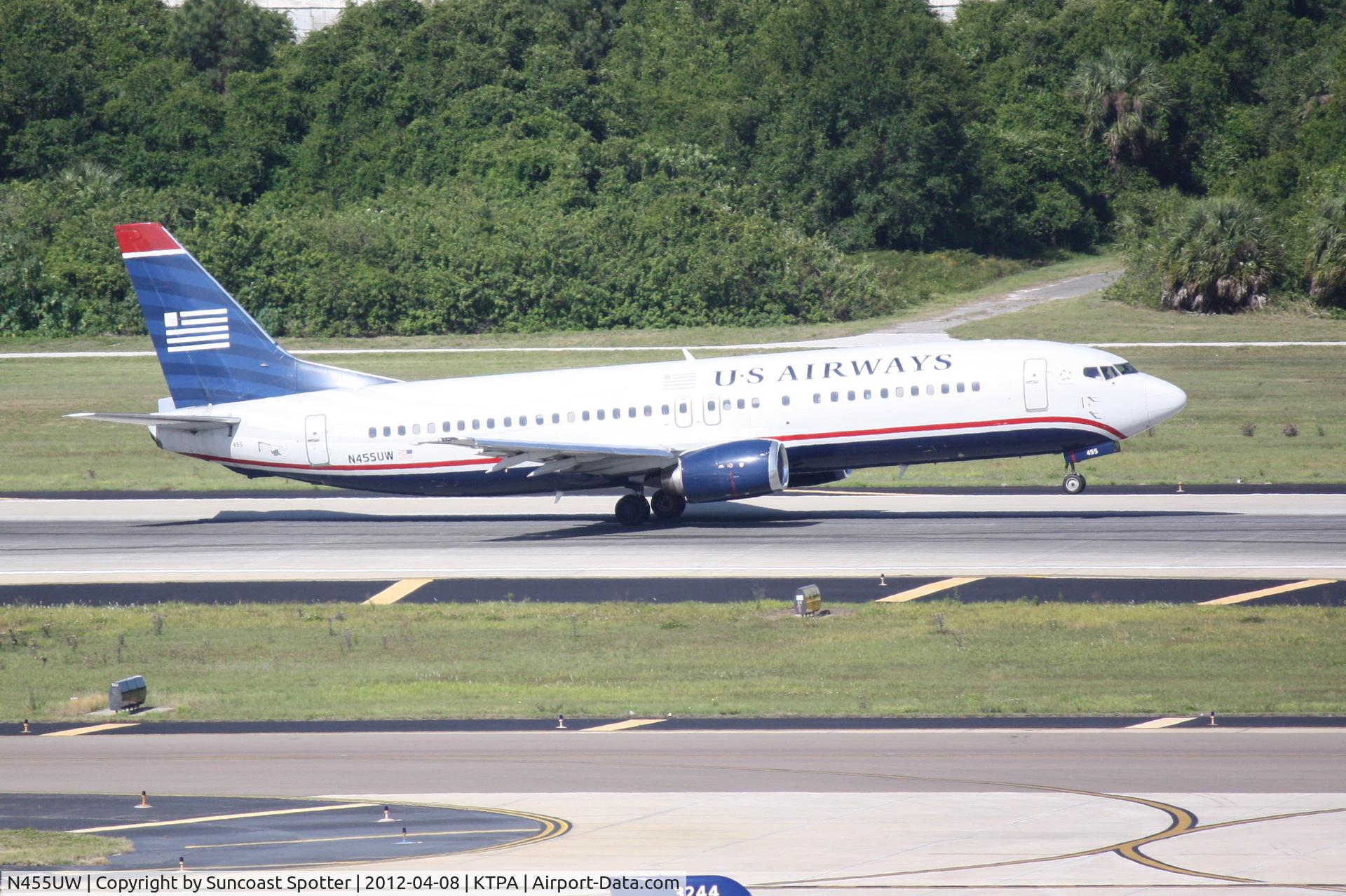 N455UW, 1991 Boeing 737-4B7 C/N 24997, US Air Flight 1179 departs Runway 1L at Tampa International Airport enroute to Charlotte-Douglas International Airport