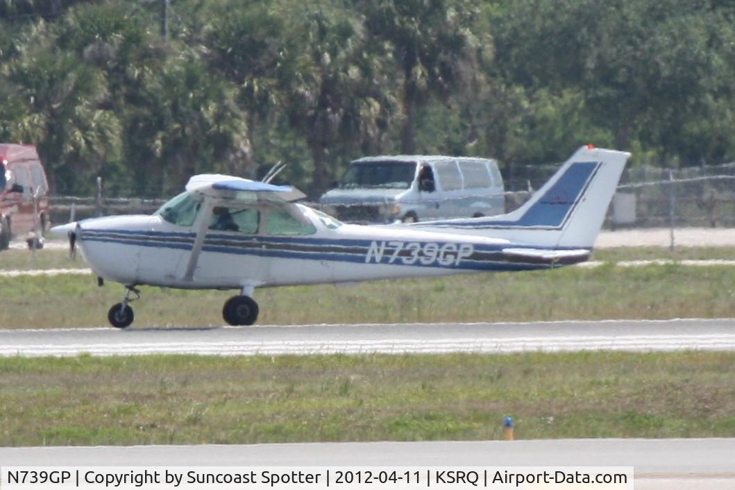 N739GP, 1978 Cessna 172N C/N 17270534, N739GP performs a touch and go on Runway 32 at Sarasota-Bradenton International Airport