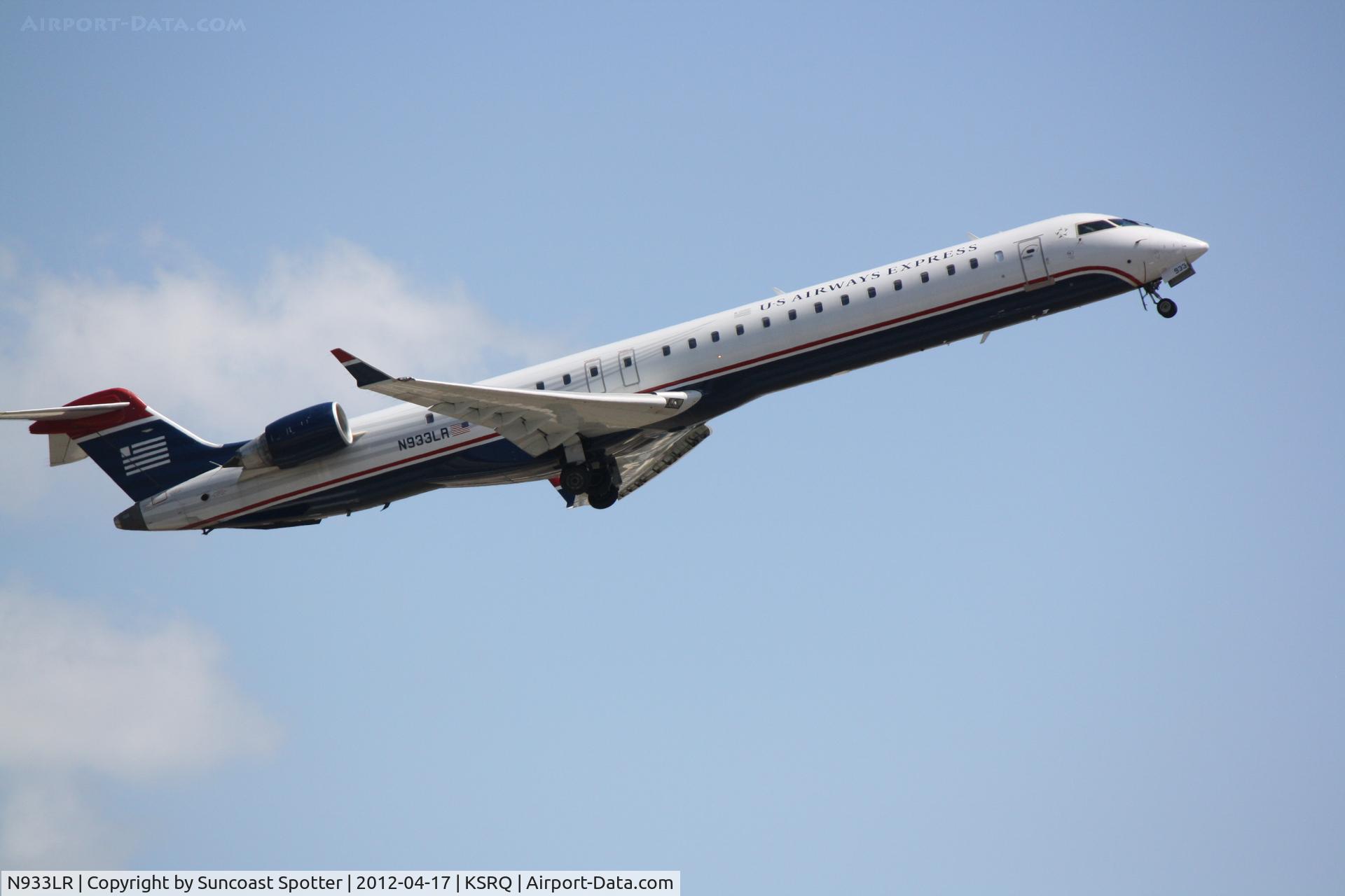 N933LR, 2005 Bombardier CRJ-900ER (CL-600-2D24) C/N 15033, Mesa Flight 2662 departs Sarasota-Bradenton International Airport enroute to Charlotte-Douglas International Airport
